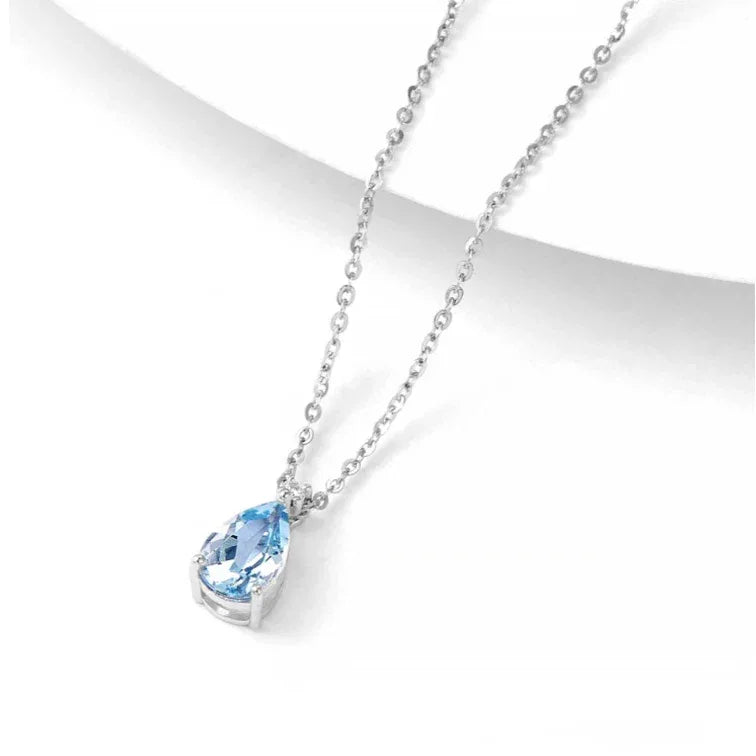 Pear-Cut Aquamarine Pendant Necklace styled neckline view showing pendant scale