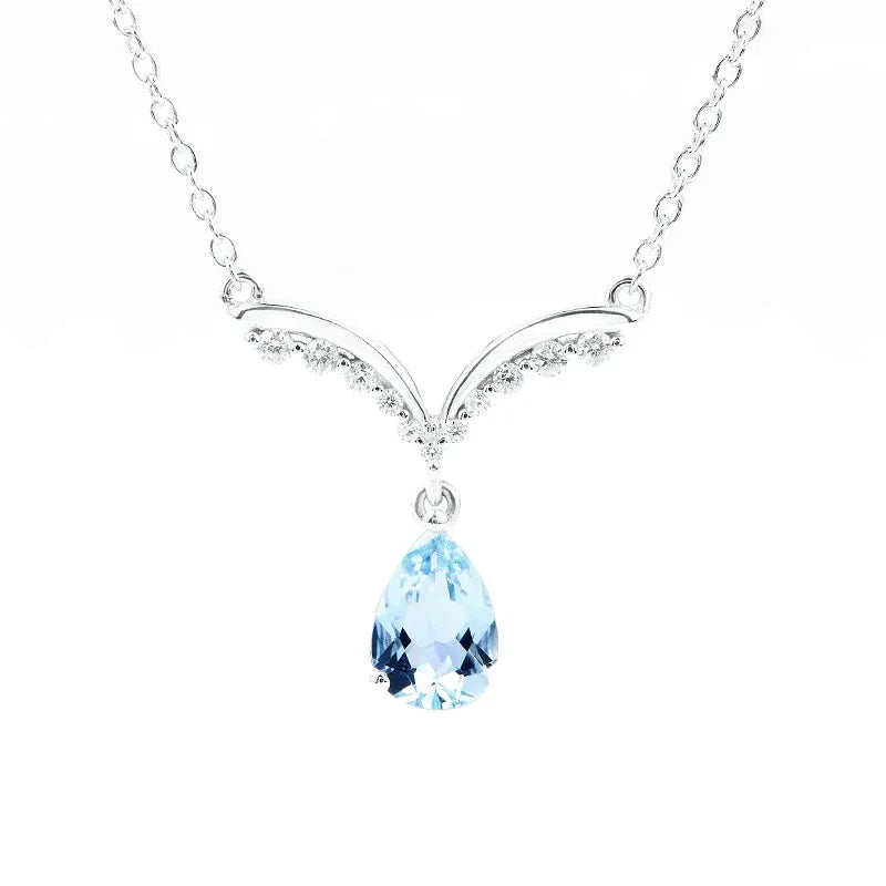 Pear-Cut Aquamarine Wing Pendant Necklace angled pendant detail on white
