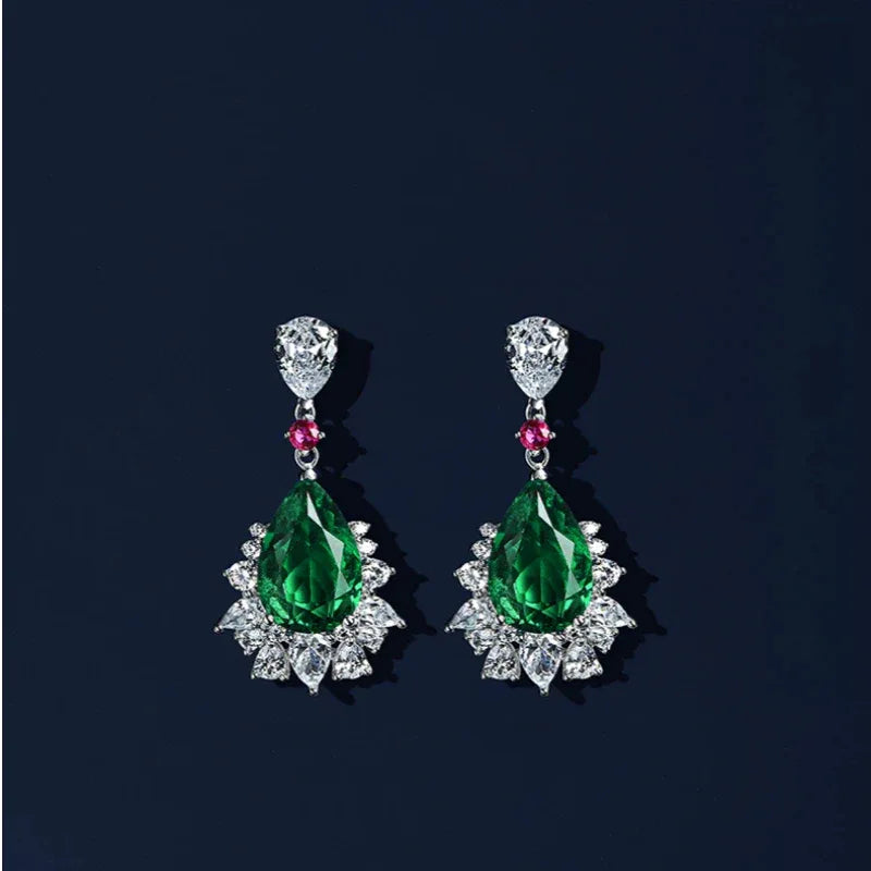 Pear-Cut Emerald and Pink Accent Drop Earrings paired product view on a dark background