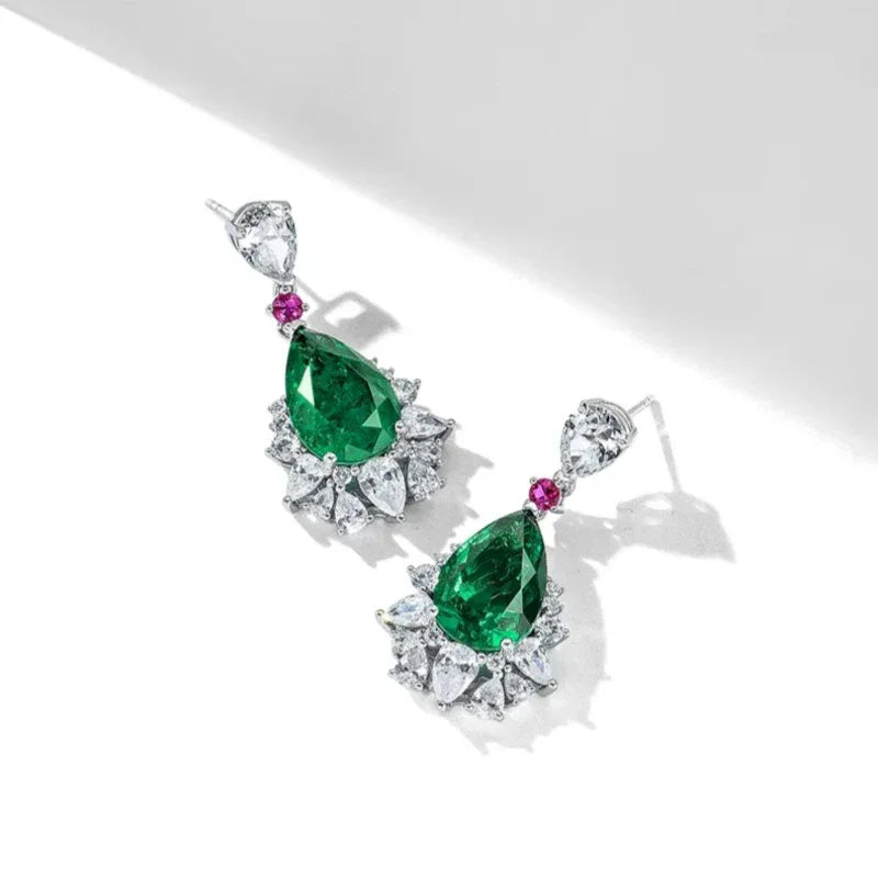 Pear-Cut Emerald and Pink Accent Drop Earrings side view showing posts and settings