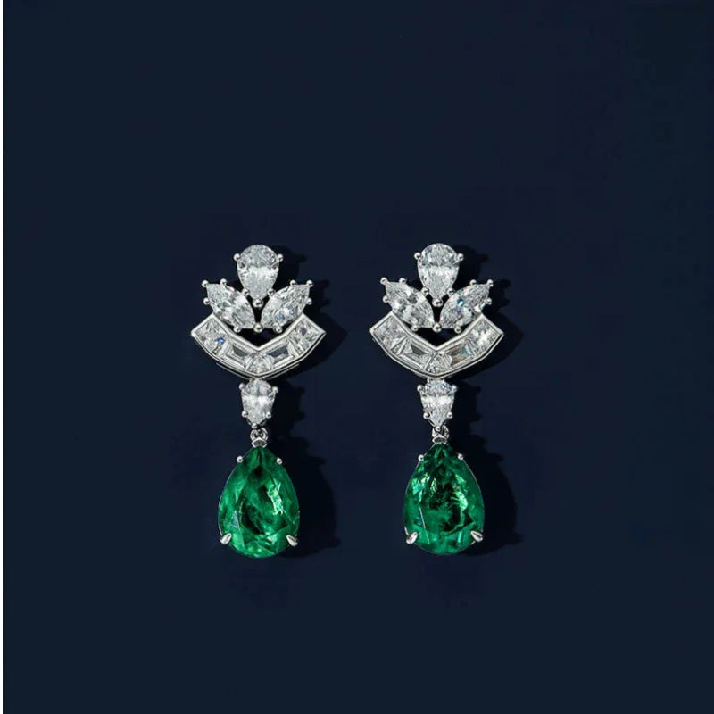 Pear-Cut Emerald Floral Drop Earrings paired product view on a dark background