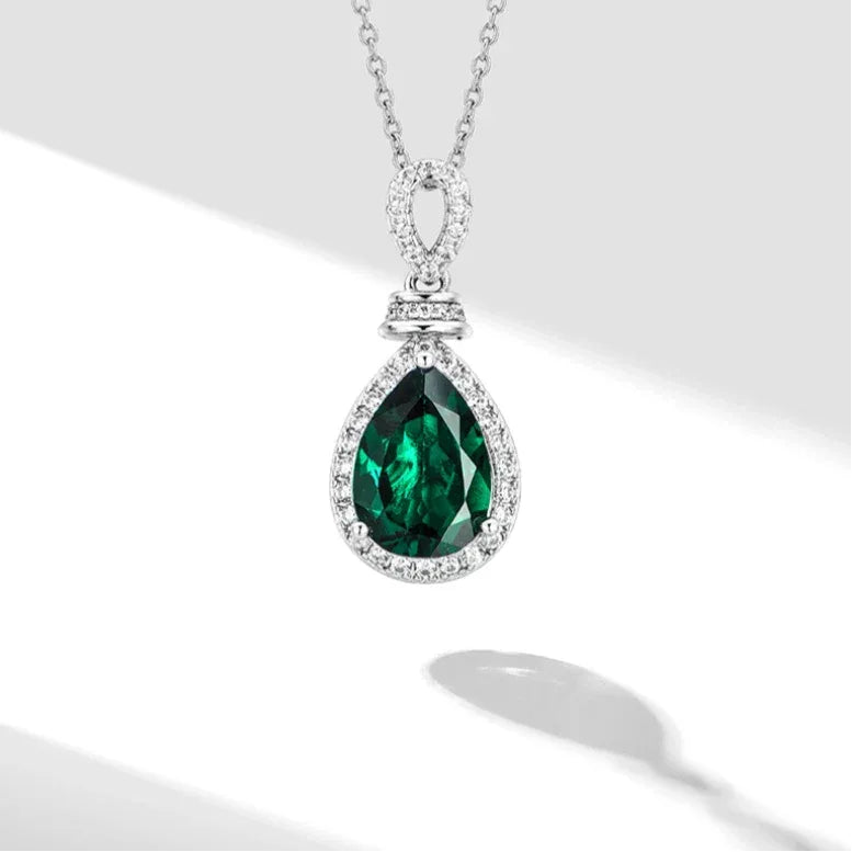 Pear-Cut Emerald Halo Pendant Necklace angled pendant detail