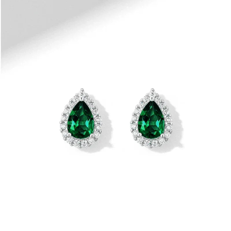 Pear-Cut Emerald Halo Stud Earrings side view showing posts and settings