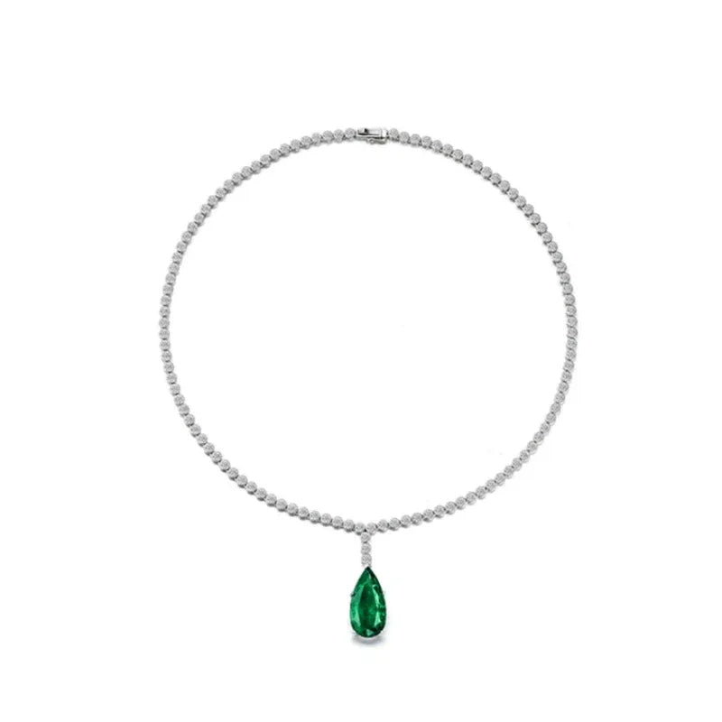 Pear-Cut Emerald Tennis Necklace pendant view on a dark background
