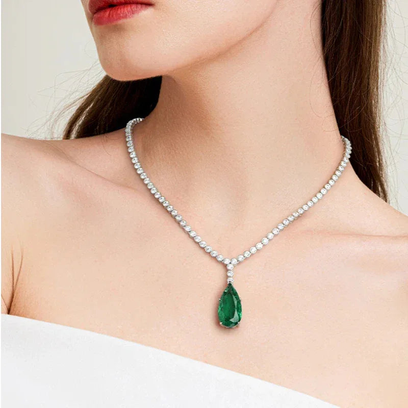 Pear-Cut Emerald Tennis Necklace worn at the neckline from a second angle