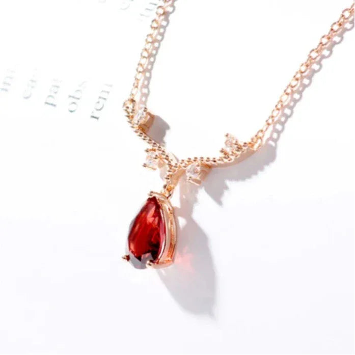 Pear-Cut Garnet Drop Necklace close-up of the pendant and chain