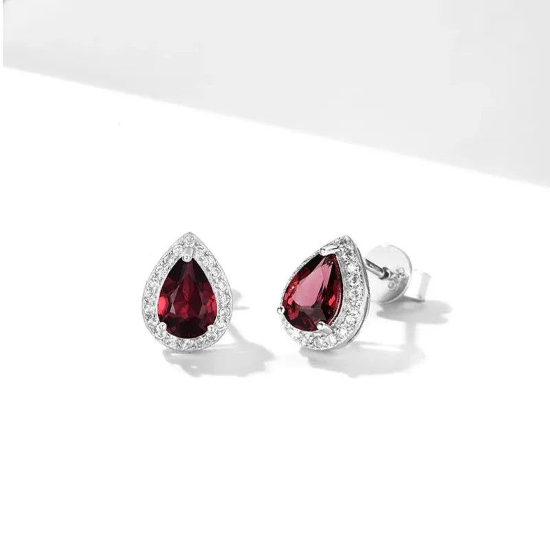 Pear-Cut Garnet Halo Stud Earrings rear and band detail view
