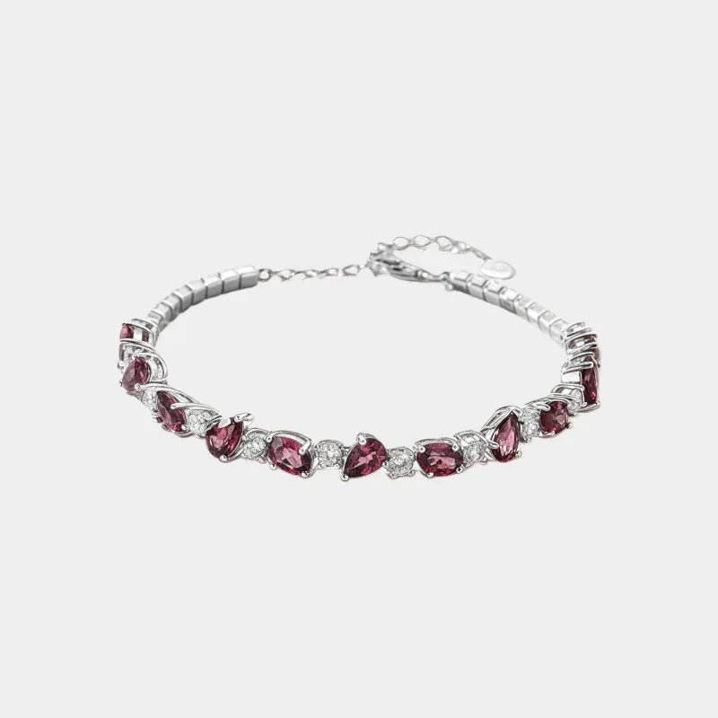 Pear-Cut Garnet Tennis Bracelet full bracelet view on a light background