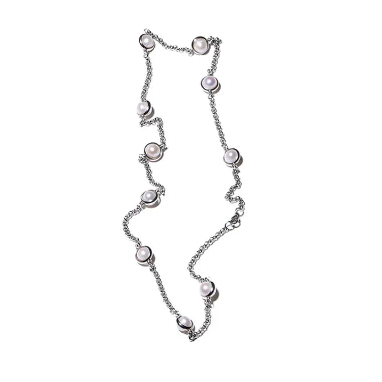 Station Pearl Chain Necklace — loosely arranged product view showing chain flexibility