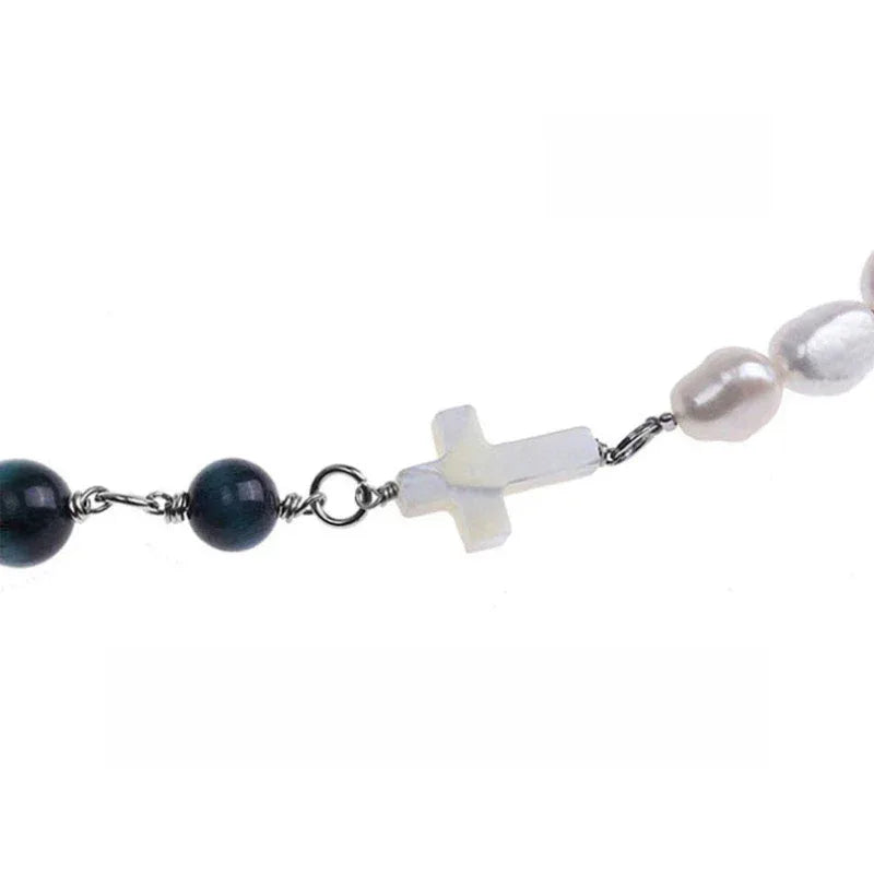 Pearl and Black Tiger Eye Cross Necklace — macro view of the small white cross connector between the bead sections