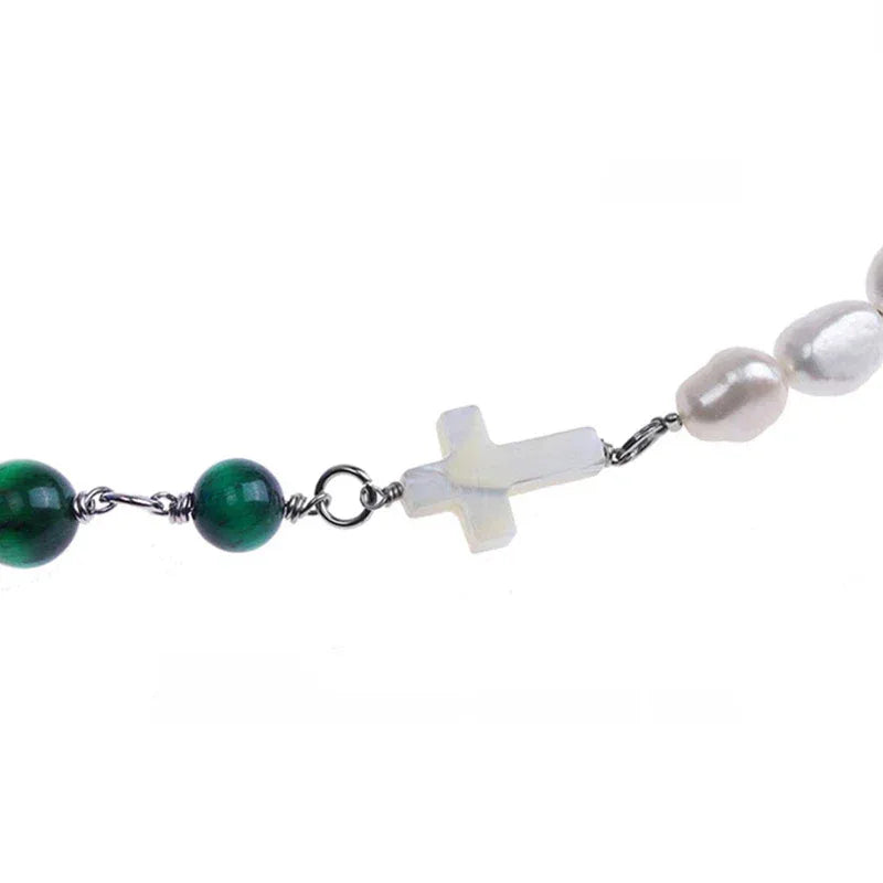 Pearl and Green Tiger Eye Cross Necklace — closer chest-worn view showing the transition between green beads
