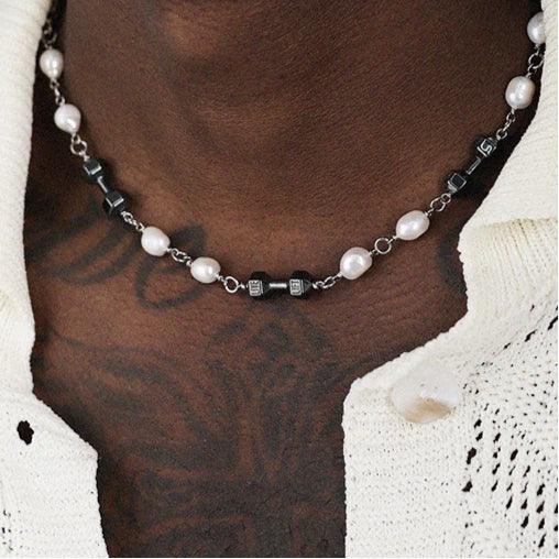 Pearl and Obsidian Beaded Necklace — neckline-worn view with a white knit shirt