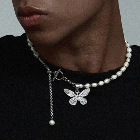 Pearl and Tiger Eye Butterfly Necklace — closer worn view showing the pearl strand and butterfly scale