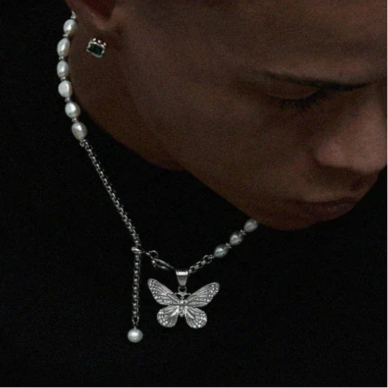 Pearl and Tiger Eye Butterfly Necklace — side neckline-worn view over a black top