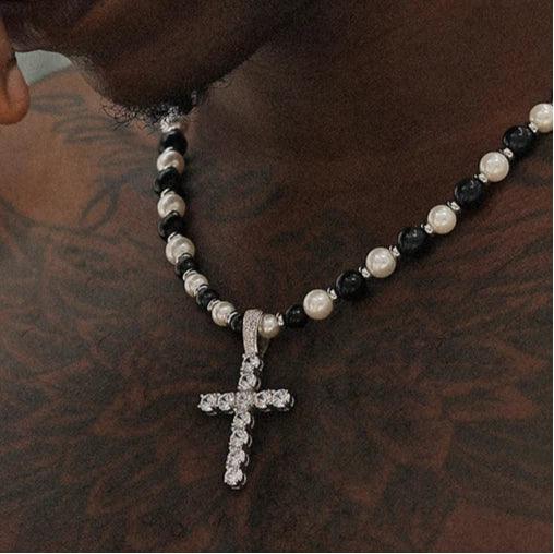 Pearl and Tiger Eye Cross Necklace — closer chest-worn view showing the beaded strand