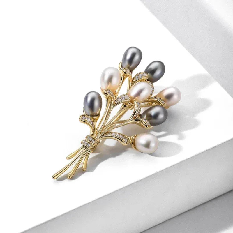 Two-Tone Pearl Bouquet Brooch — angled product view on white