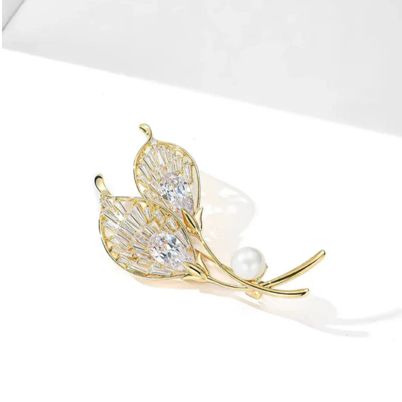 Pearl Calla Lily Brooch — angled product view on white showing design and scale
