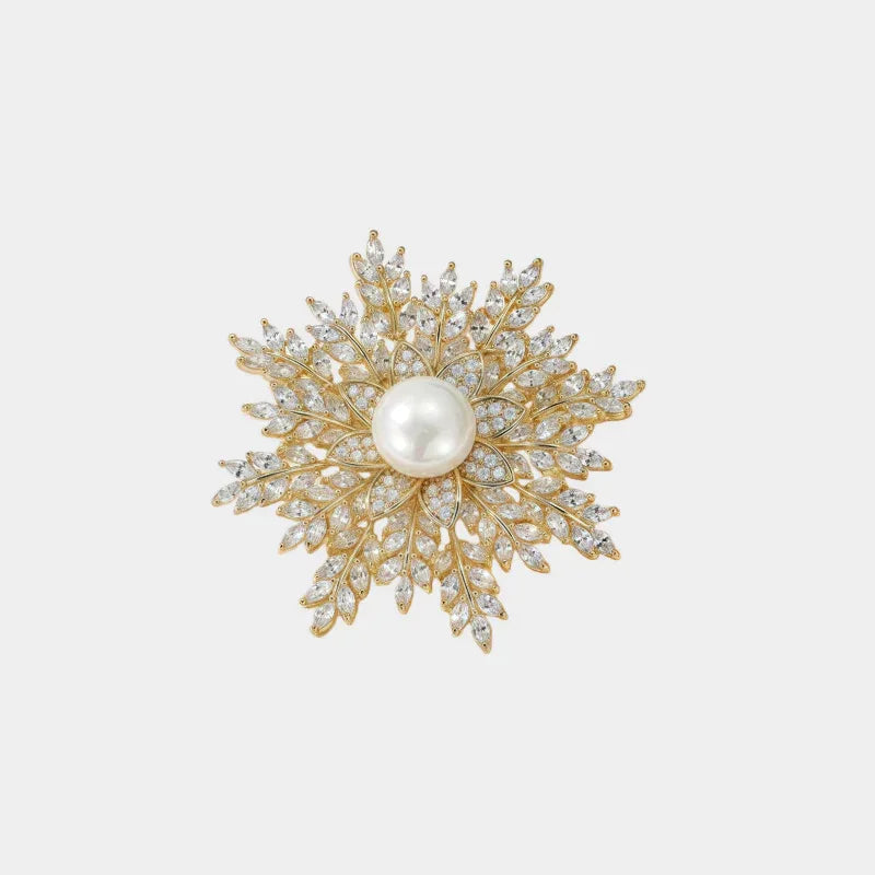 Pearl Snowflake Brooch — front view of gold-tone snowflake brooch