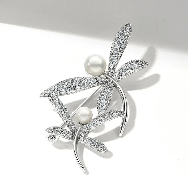 Pearl and Cubic Zirconia Dragonfly Brooch — angled product close-up on white