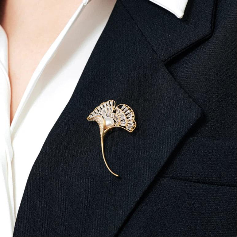 Pearl Ginkgo Leaf Brooch — close blazer-worn view showing scale
