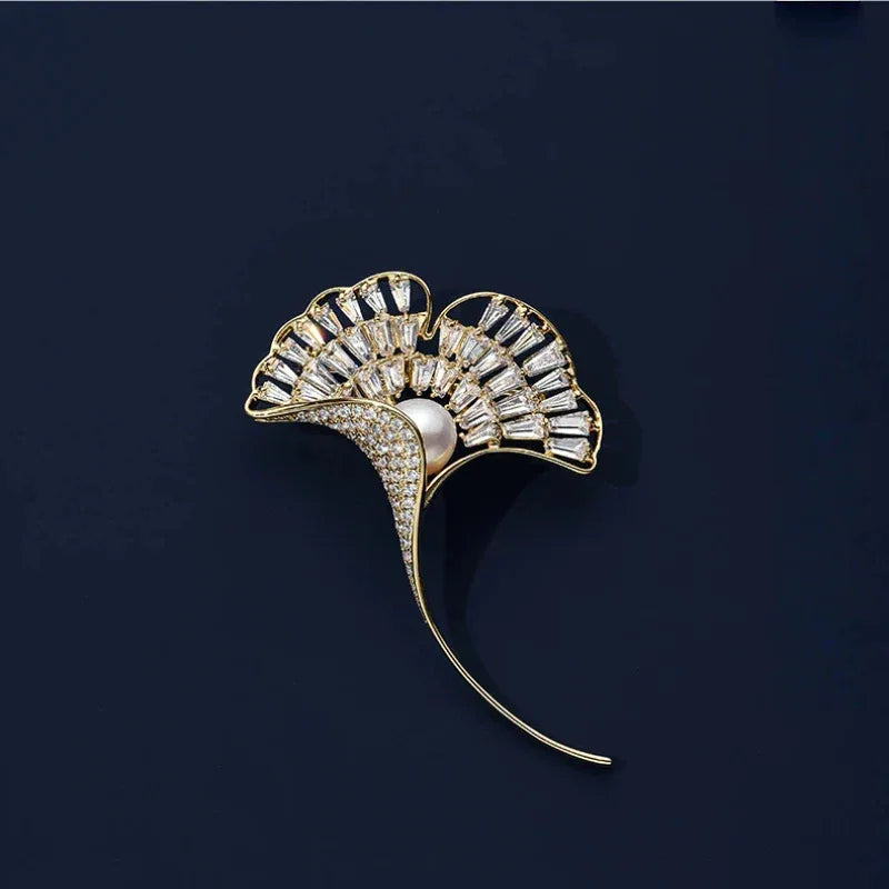 Pearl Ginkgo Leaf Brooch — front product view on a dark background