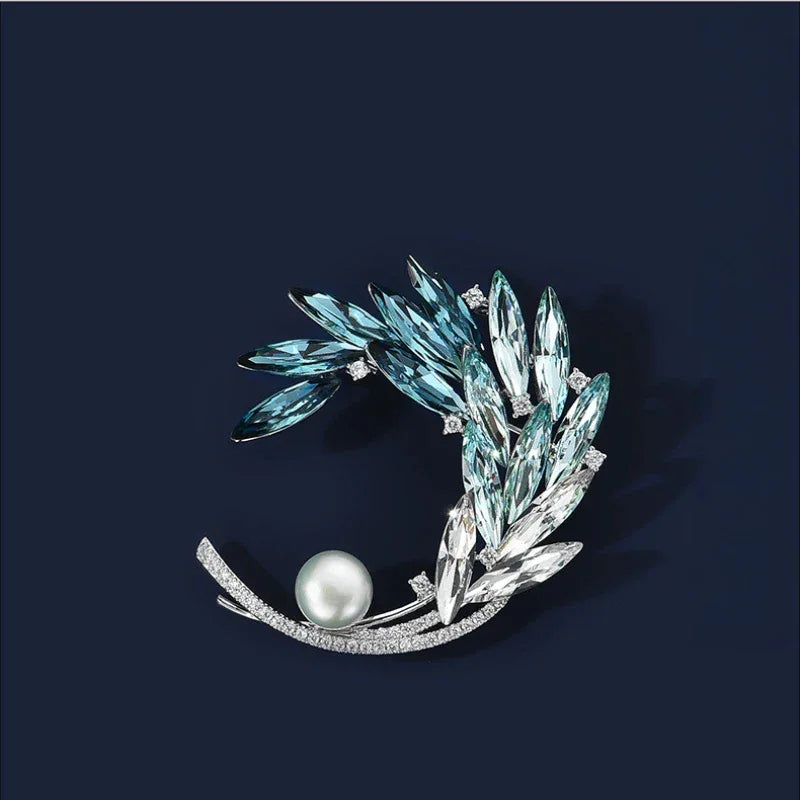 Gradient Blue Wheat Wreath Pearl Brooch — front product view on a dark background