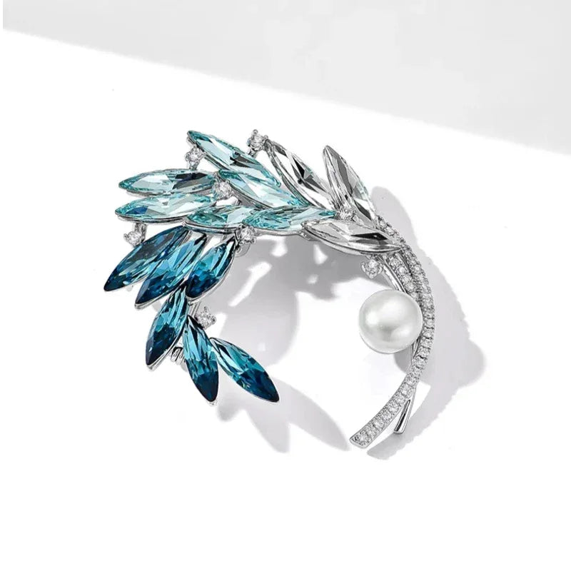Gradient Blue Wheat Wreath Pearl Brooch — angled product view on white showing the curved stem