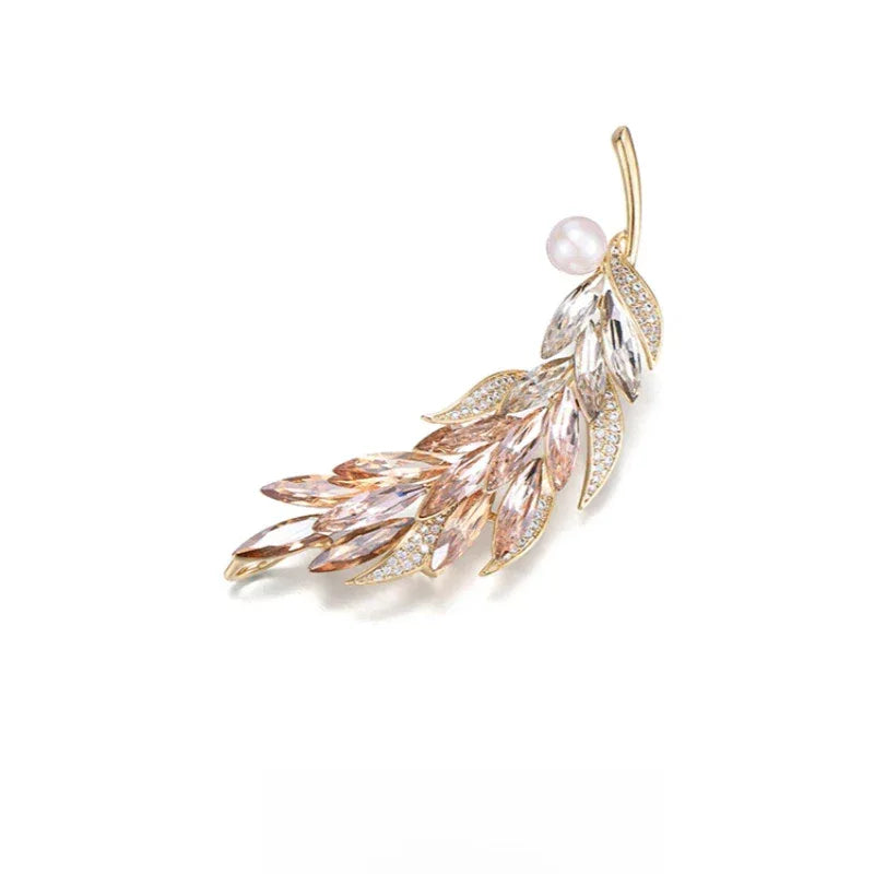 Pearl Gradient Wheat Sprig Brooch — angled product view showing the curved stem and pearl