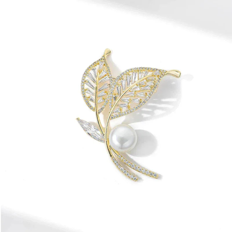 Pearl Double-Leaf Brooch — angled product view on white showing design and scale