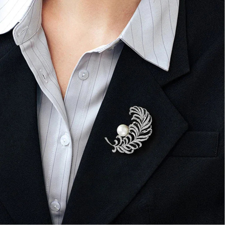 Pearl Feather Brooch — alternate close blazer-worn view showing design and scale
