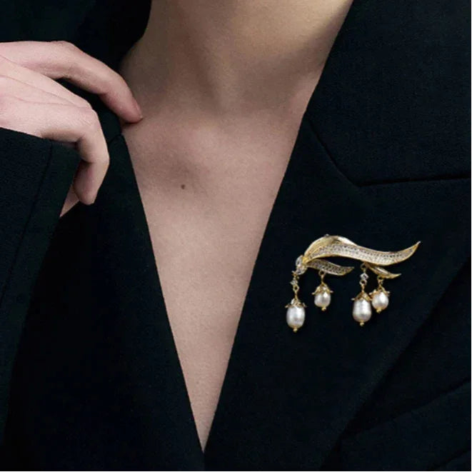Pearl Lily of the Valley Tassel Brooch — alternate black-blazer worn view showing scale