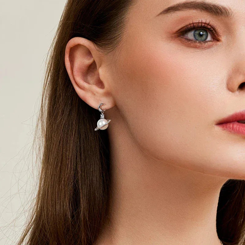 Moon and Star Pearl Planet Drop Earrings — alternate right-ear worn portrait showing both motifs