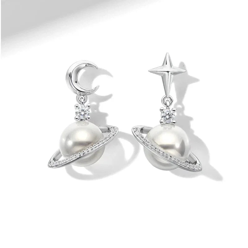 Moon and Star Pearl Planet Drop Earrings — front pair on white