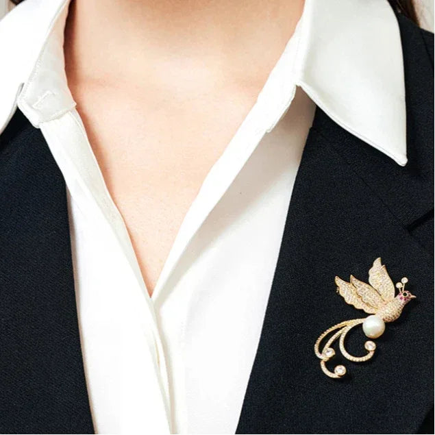 Pearl Phoenix Brooch — alternate close blazer-worn view showing design and scale