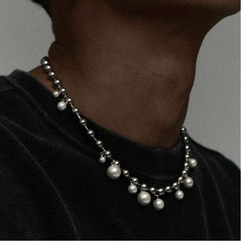 Steel Chain Necklace with Pearl Drops — close worn view showing the graduated hanging pearls