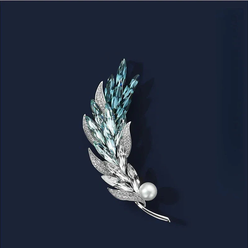 Blue Wheat Sprig Pearl Brooch — front product view on a dark background