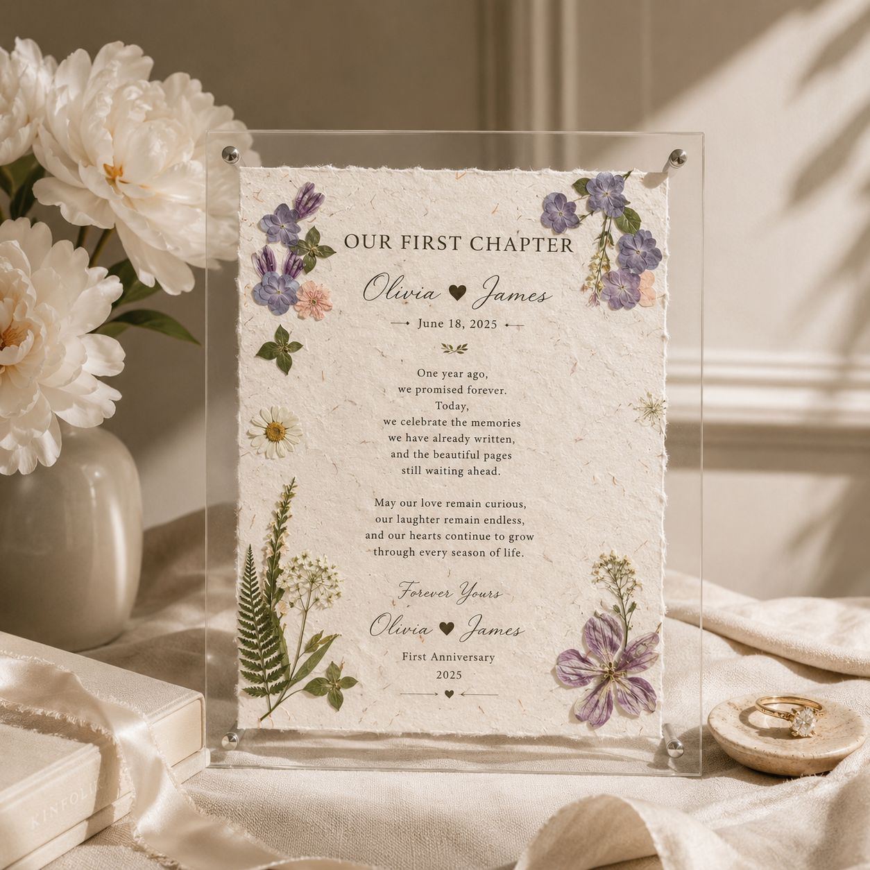 Close-up detail of handmade cotton paper corner showing natural deckled edges real pressed purple hydrangea flowers pink