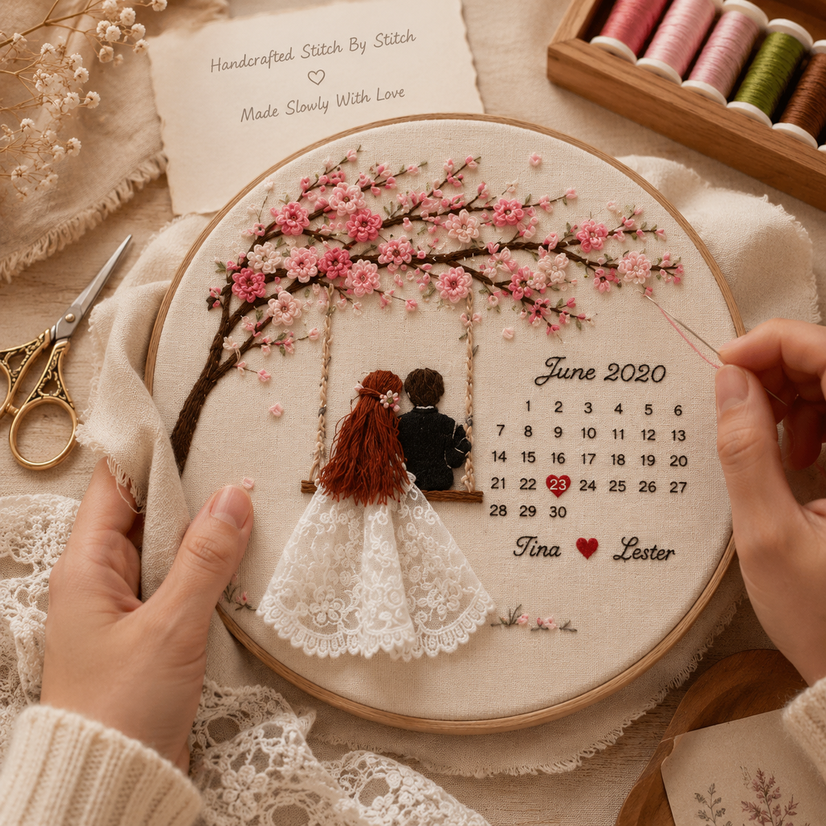 Personalized Embroidered Cherry Blossom Anniversary Frame – Custom Couple Calendar Keepsake, artisan working on the piece...