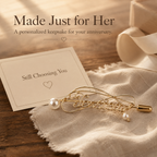 Personalized Pearl Name Brooch – Custom Gold-Tone Name Pin with Pearl Accent, styled product scene with...