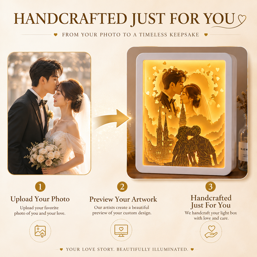 Warm glowing paper cut light box with romantic couple silhouette and heart motifs displayed on a bedside table with