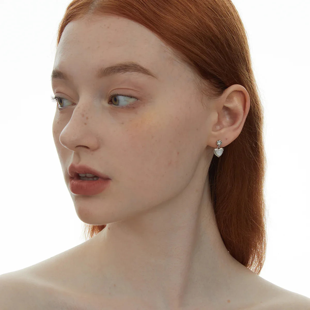 Pearl Heart Drop Earrings with Ornate Frame — alternate right-ear worn portrait