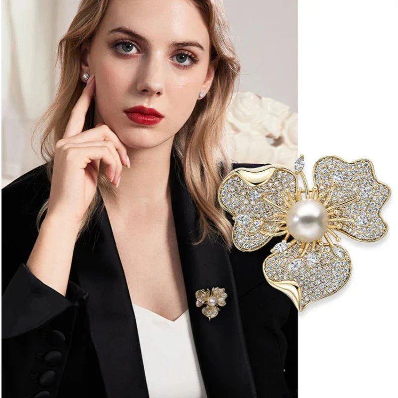 Pearl and Cubic Zirconia Plum Blossom Brooch — model portrait with the brooch pinned on a black blazer
