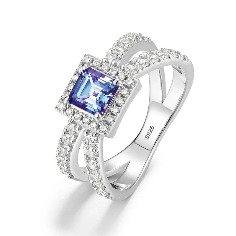 Princess-cut Alexandrite halo ring with a split shank, alternate front product view on a white background