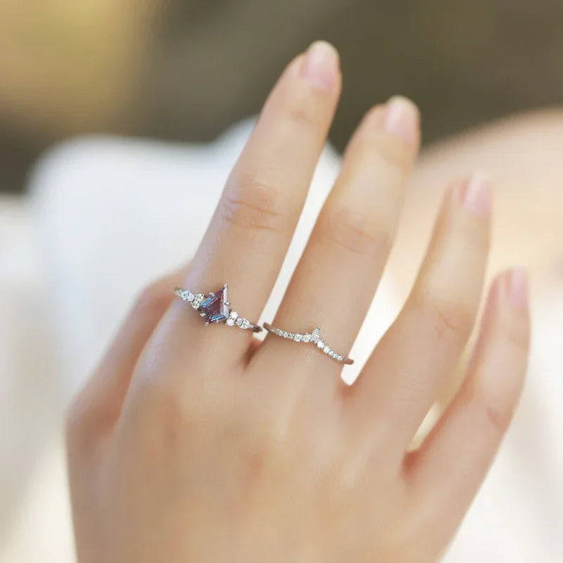 Princess-cut Alexandrite two-band ring with clear accents, alternate shown worn in a close lifestyle view