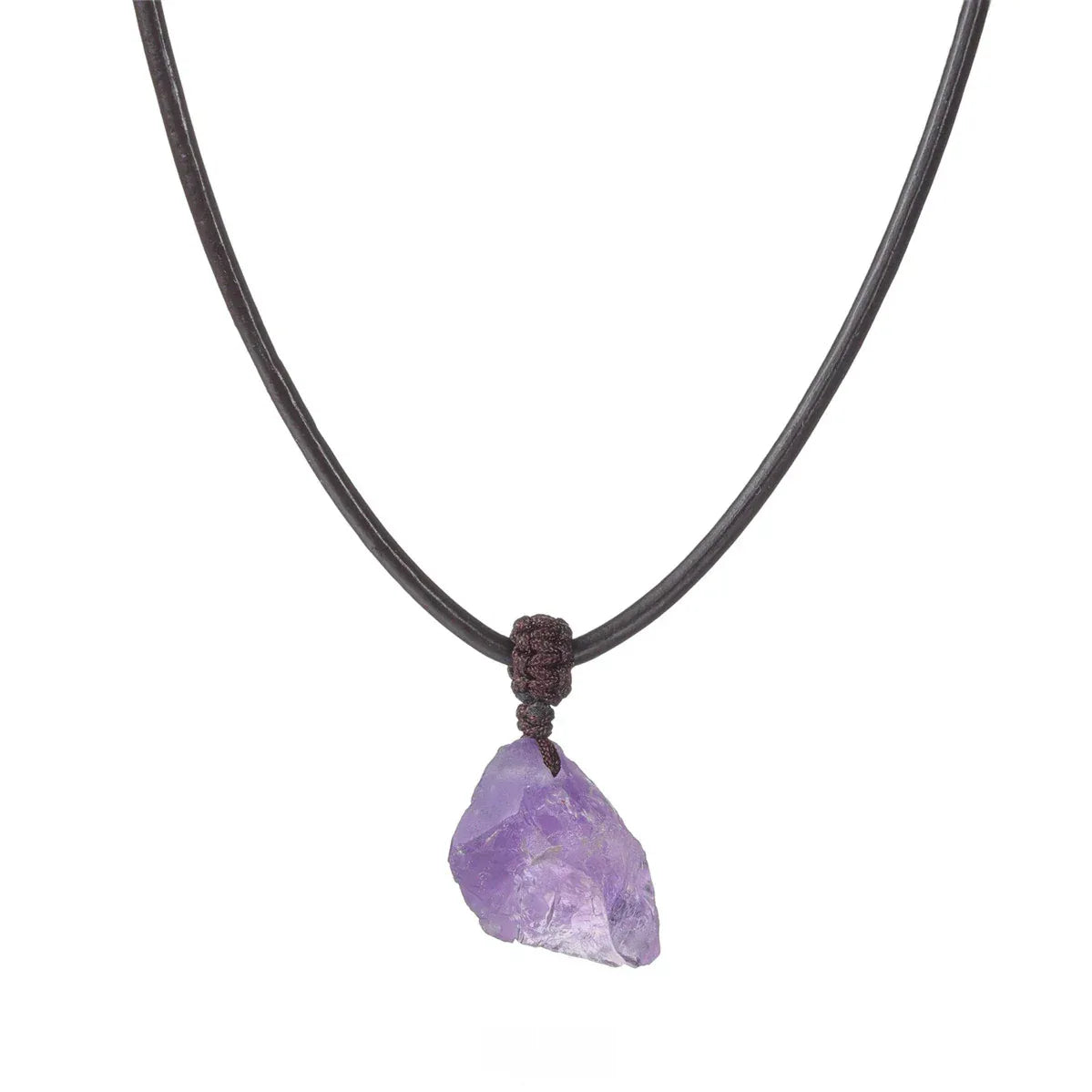 raw amethyst stone cord necklace pendant and black cord on a white background