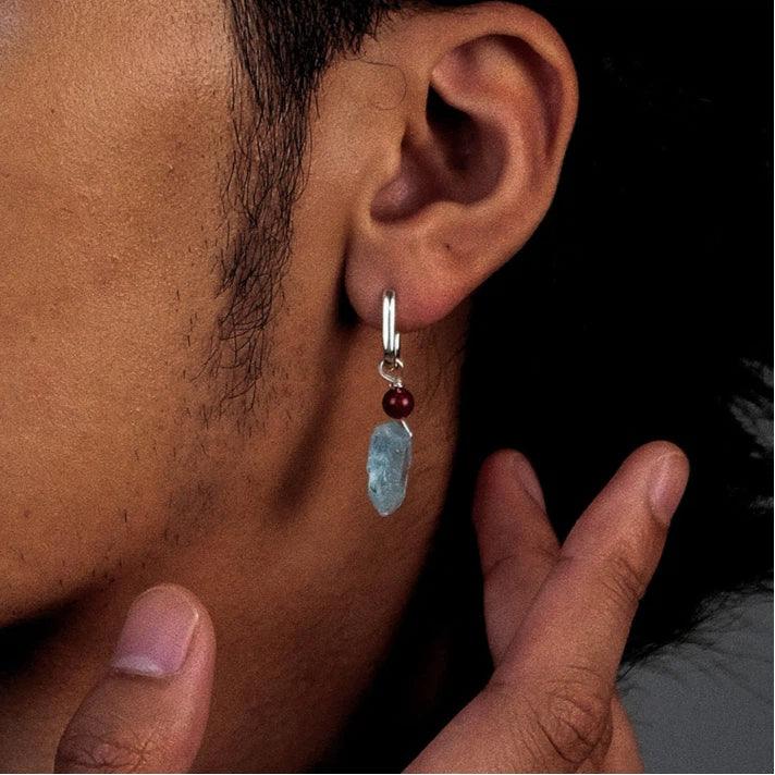 Raw Aquamarine and Cinnabar Drop Earrings worn on the ear from a second angle