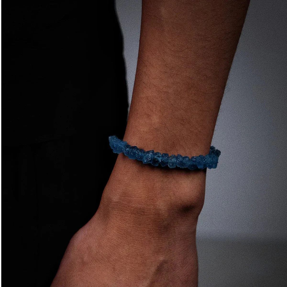Raw Aquamarine Chip Bead Bracelet worn on the wrist from a second angle