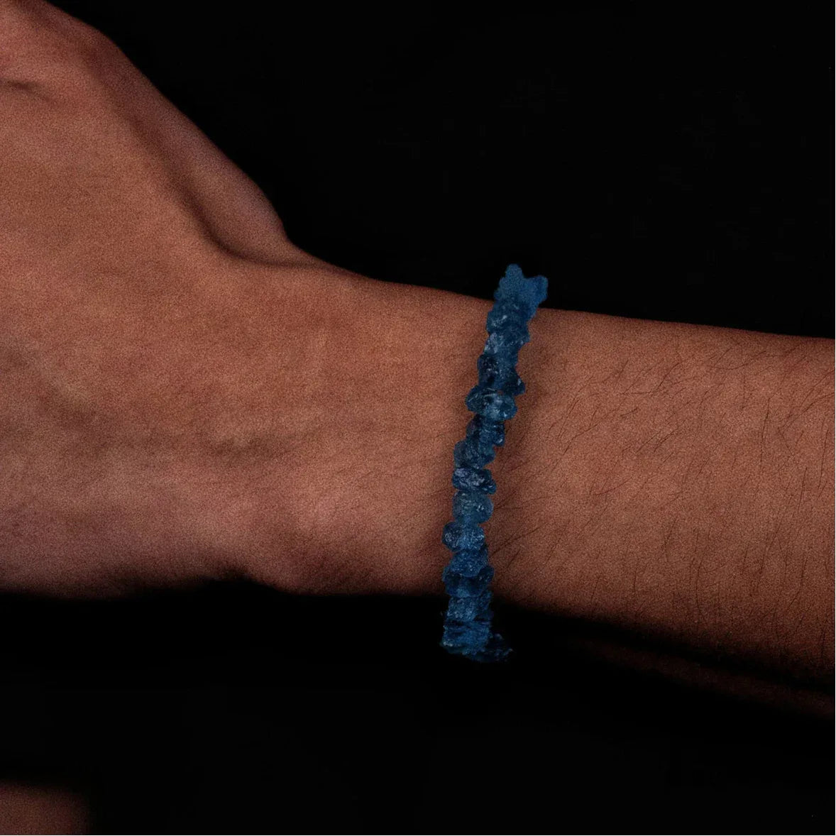 Raw Aquamarine Chip Bead Bracelet worn on the wrist in a close-up