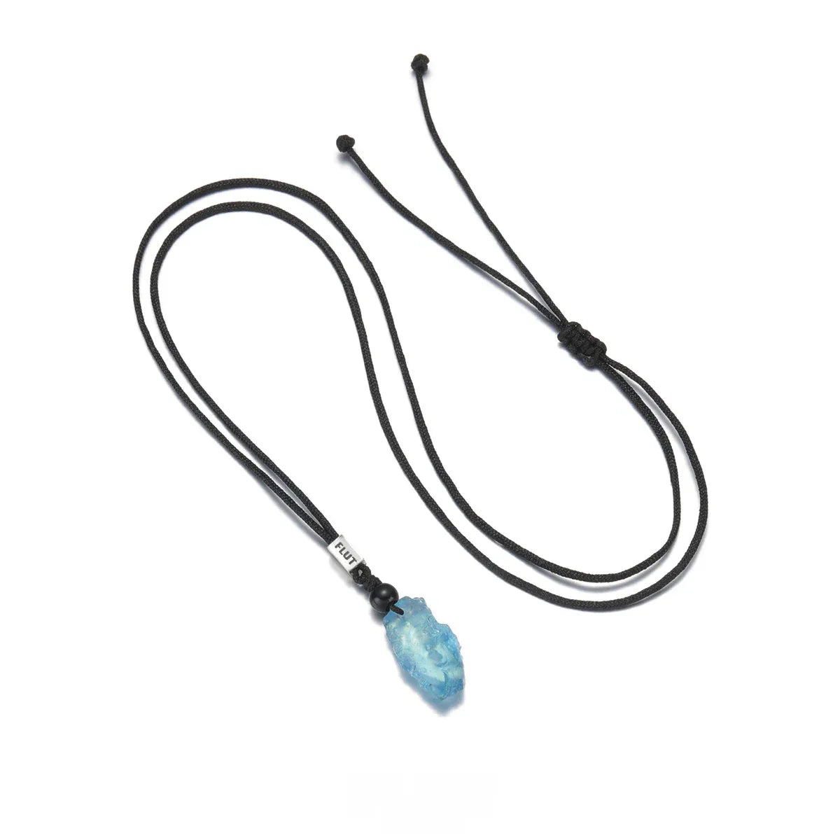 Raw Aquamarine Cord Pendant Necklace pendant and chain detail on a light background