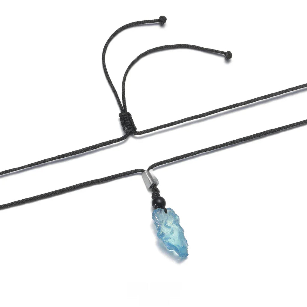 Raw Aquamarine Cord Pendant Necklace styled neckline view showing pendant scale
